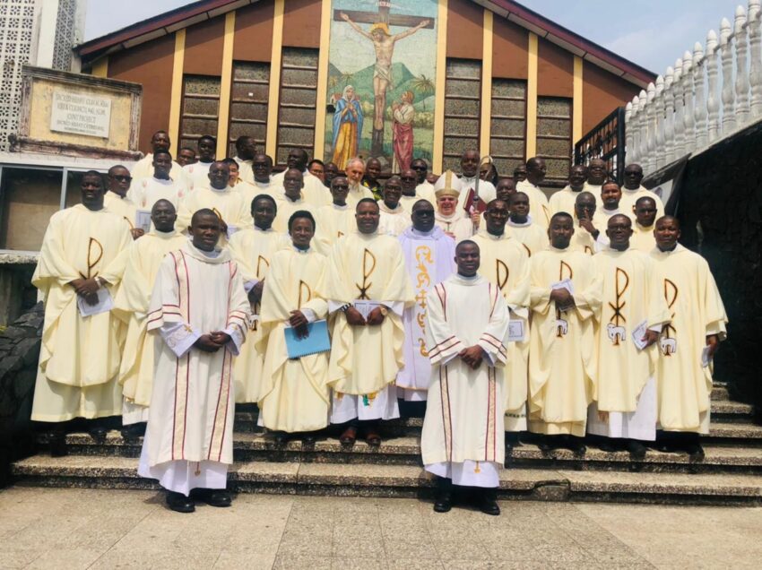 Priests and Deacons assembled in front of the Sacred Heart Cathedral in Monrovia